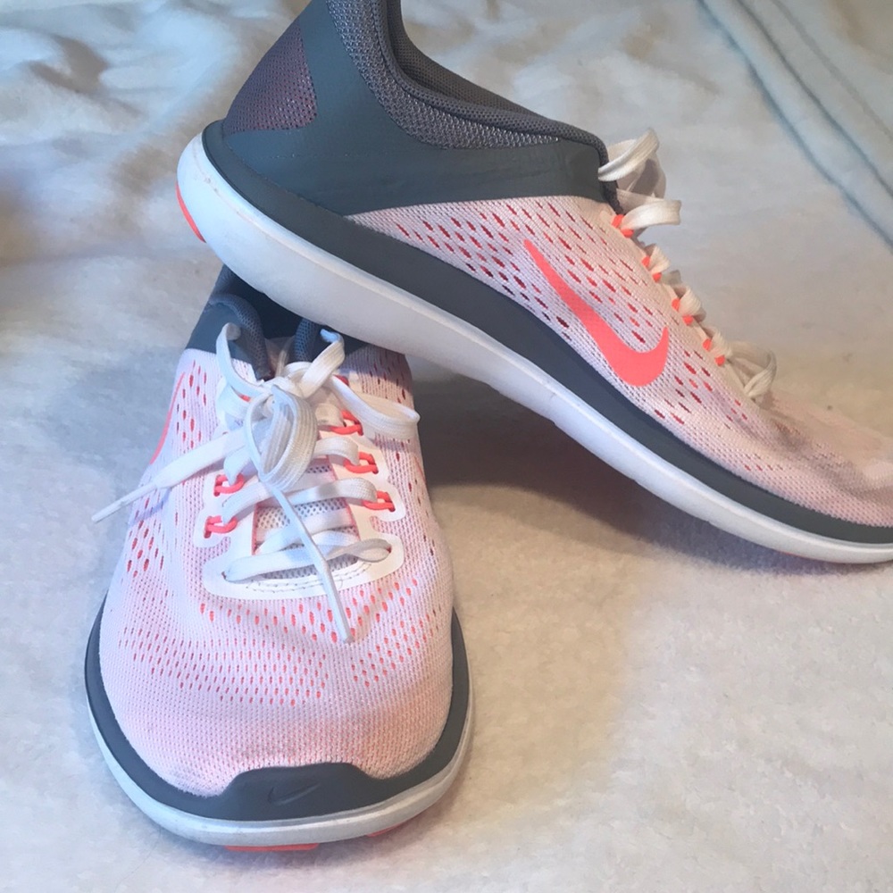 White, coral, gray women’s Nike shoes